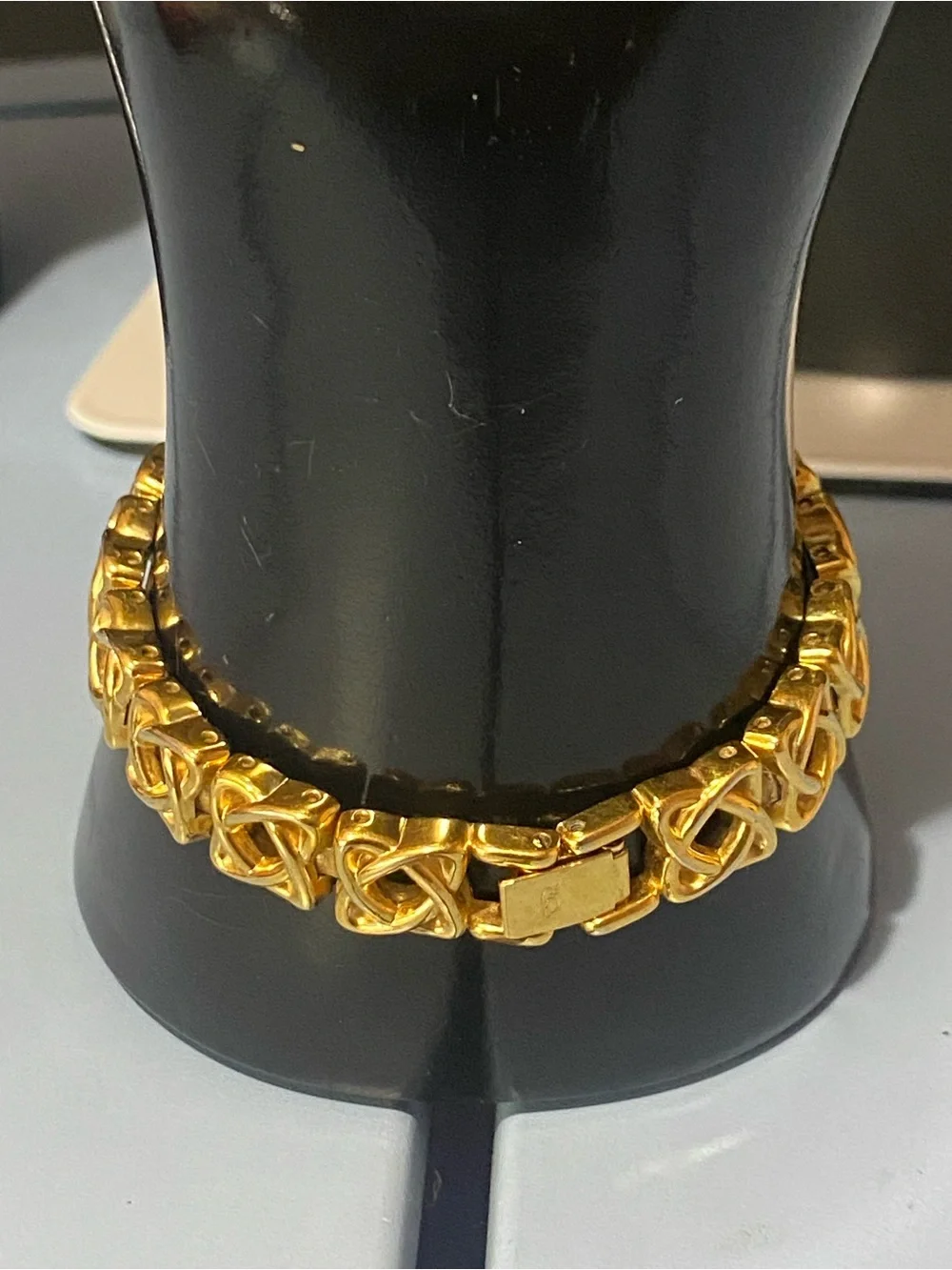 Decan De La Renta gold tone designer watch